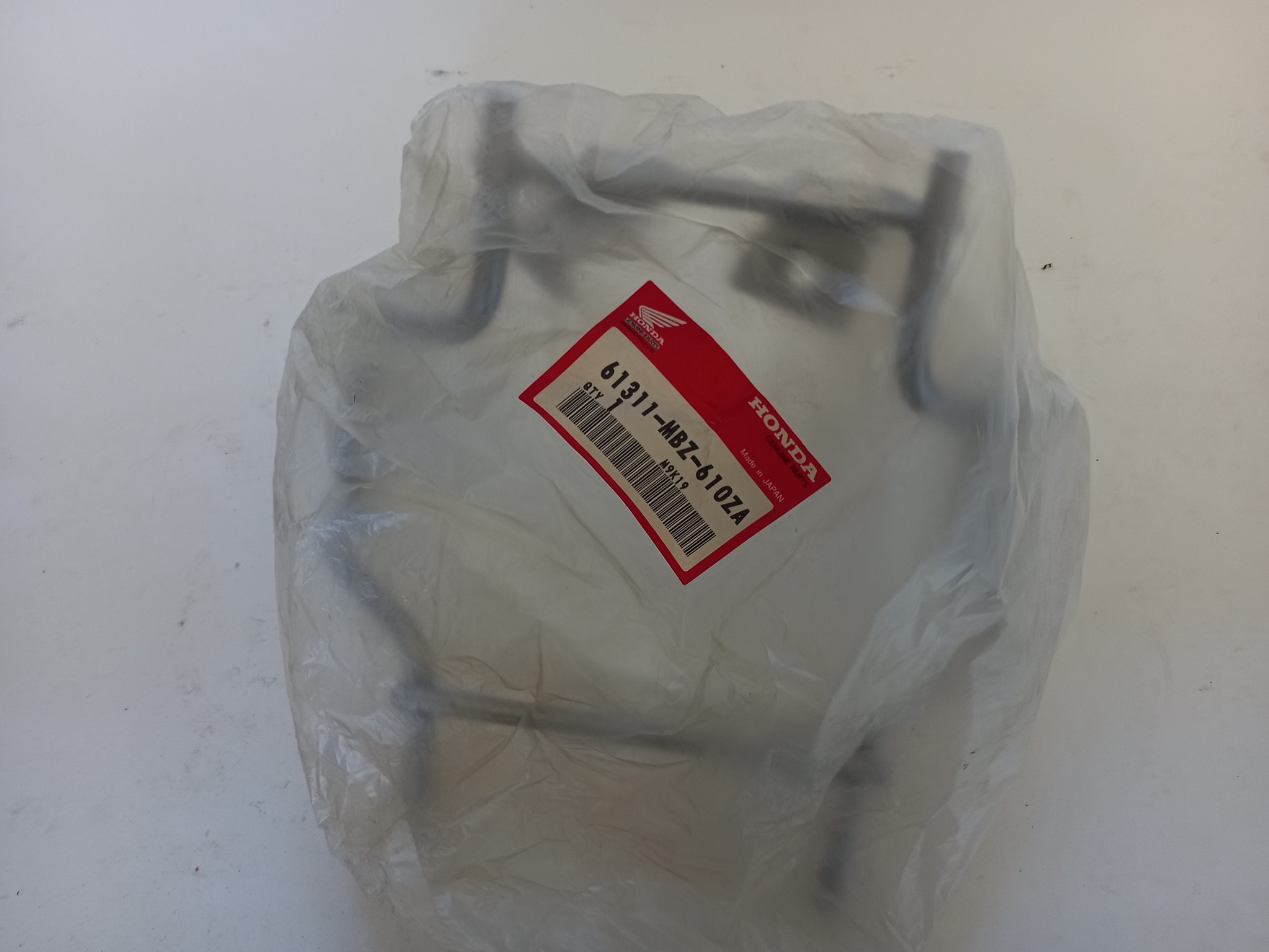 Bild von Honda  STUETZE KOMPL., SCHEINWER  61311-MBZ-610ZA